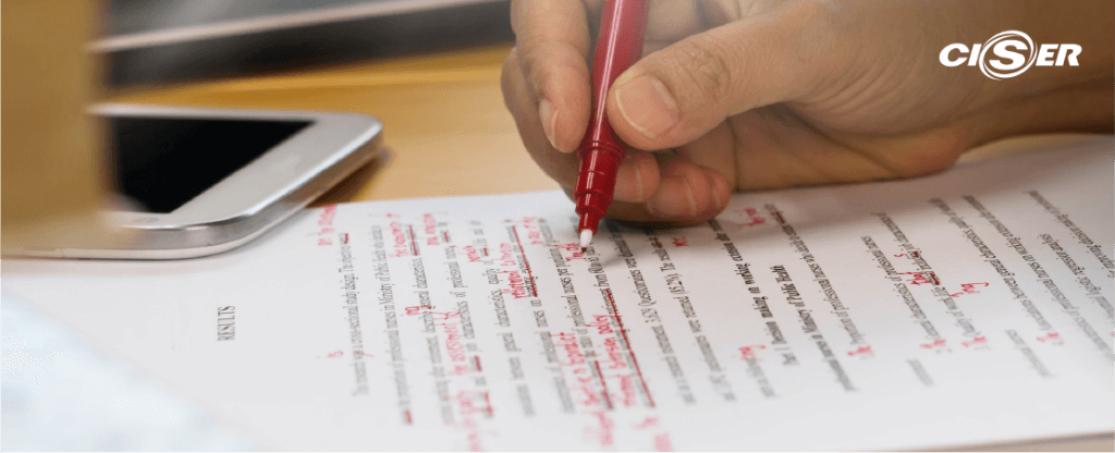 Dicas rápidas de redação - texto corrigido com caneta vermelha 